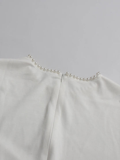 Abaya mit Perlenbesatz