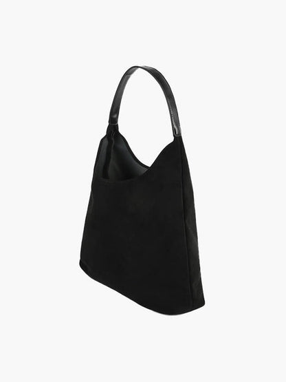Handtasche in Wildlederoptik