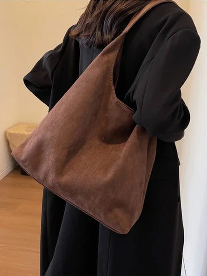 Handtasche in Wildlederoptik